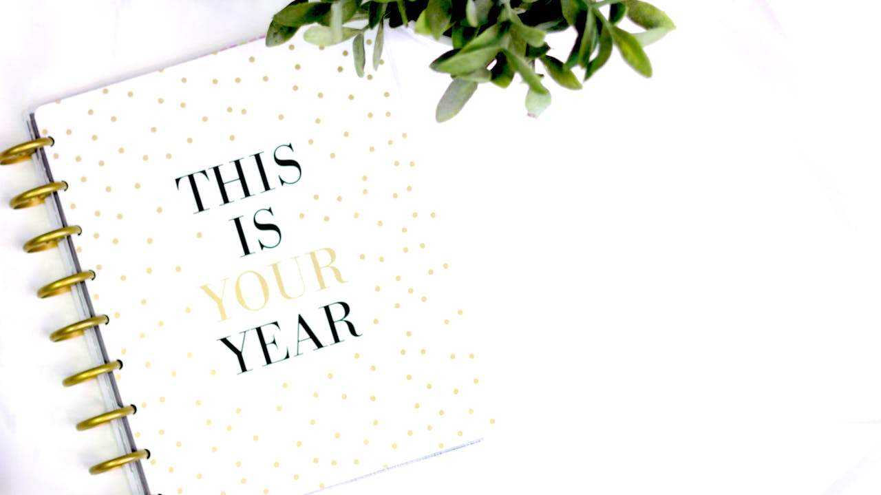 services-05 A stylish planner with motivational text and polka dot design, perfect for a fresh start.